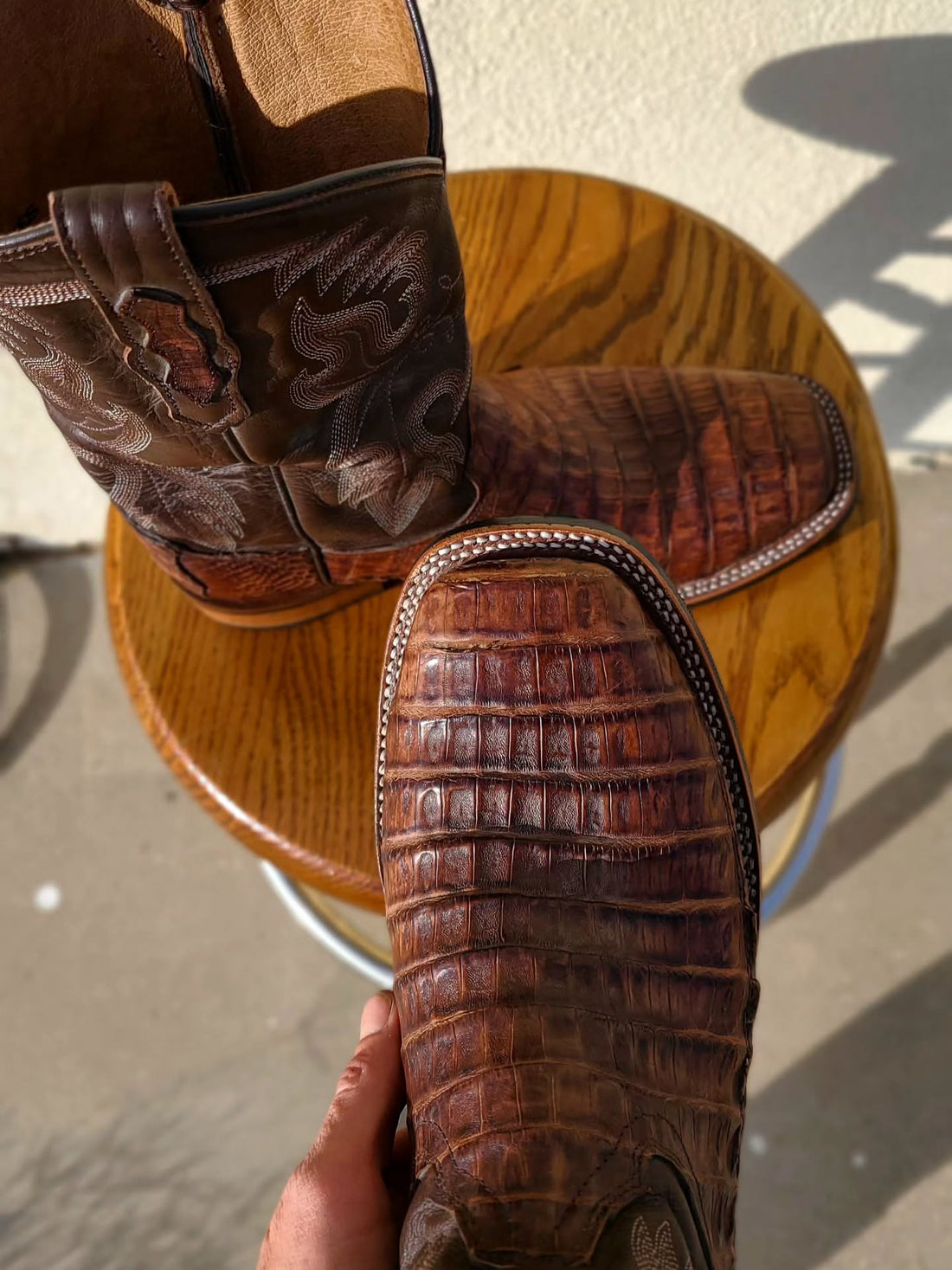 Square toe boot resoled using double stitched welt 